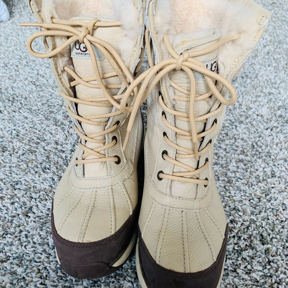 UGG water Proof beige and Brown, with sheepskin inside and leather.